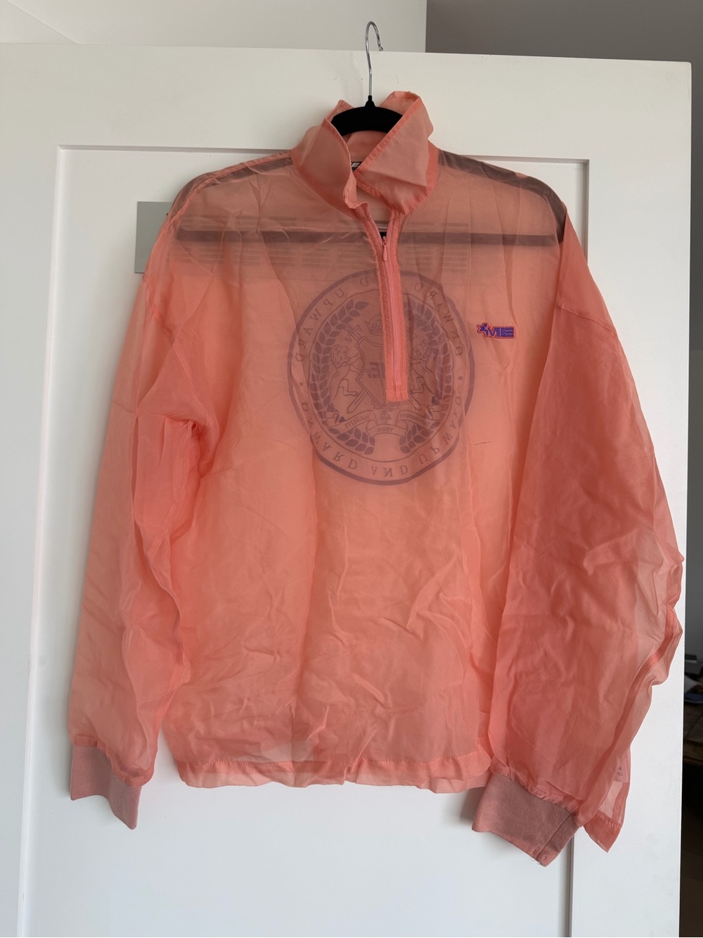 Melody Ehsani Peach Sheer Half-Zip windbreaker
